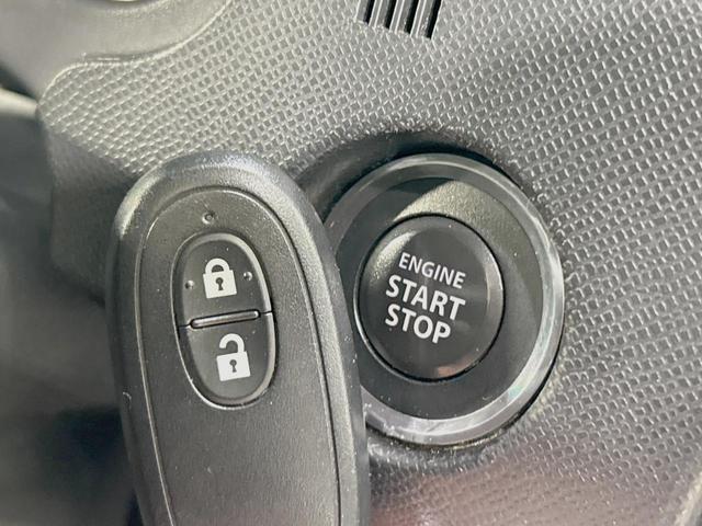 ワゴンRスティングレー X 禁煙車 スマートキー HIDヘッド フォグランプ オートエアコン 純正14インチアルミ CD 革巻きステアリング シートリフター バニティミラー 電動格納ミラー チルトステアリング イモビライザー(3枚目)