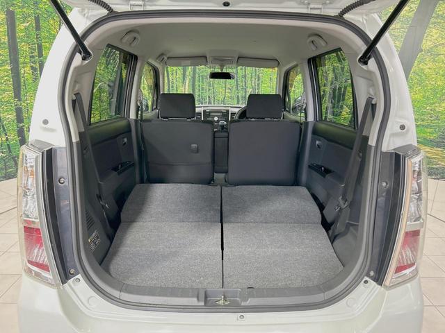 ワゴンRスティングレー X 禁煙車 スマートキー HIDヘッド フォグランプ オートエアコン 純正14インチアルミ CD 革巻きステアリング シートリフター バニティミラー 電動格納ミラー チルトステアリング イモビライザー(10枚目)