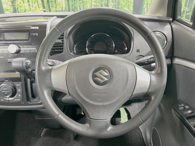 ワゴンRスティングレー X 禁煙車 スマートキー HIDヘッド フォグランプ オートエアコン 純正14インチアルミ CD 革巻きステアリング シートリフター バニティミラー 電動格納ミラー チルトステアリング イモビライザー(11枚目)