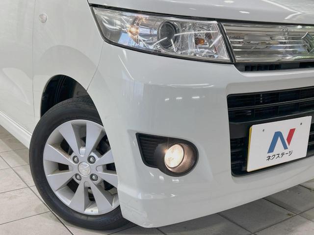 ワゴンRスティングレー X 禁煙車 スマートキー HIDヘッド フォグランプ オートエアコン 純正14インチアルミ CD 革巻きステアリング シートリフター バニティミラー 電動格納ミラー チルトステアリング イモビライザー(12枚目)