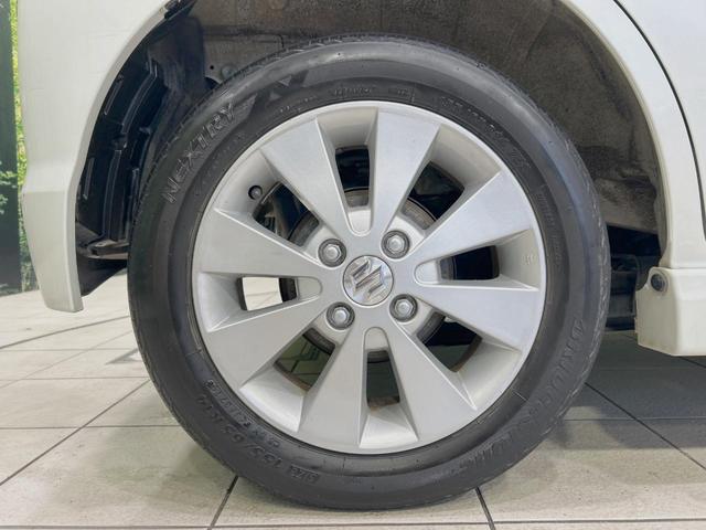 ワゴンRスティングレー X 禁煙車 スマートキー HIDヘッド フォグランプ オートエアコン 純正14インチアルミ CD 革巻きステアリング シートリフター バニティミラー 電動格納ミラー チルトステアリング イモビライザー(13枚目)