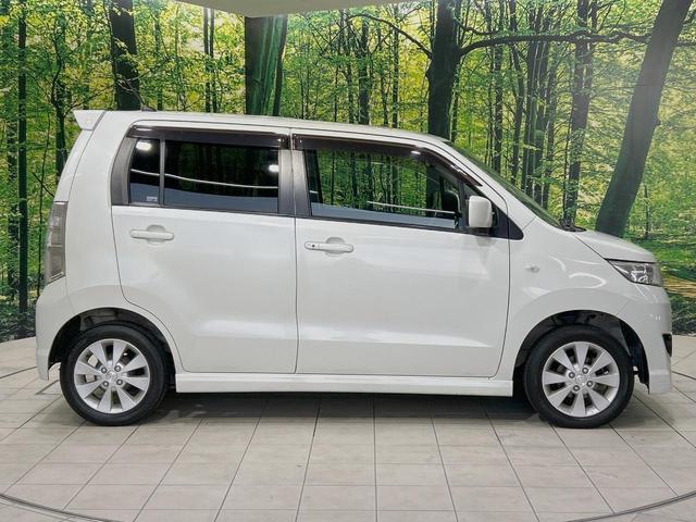 ワゴンRスティングレー X 禁煙車 スマートキー HIDヘッド フォグランプ オートエアコン 純正14インチアルミ CD 革巻きステアリング シートリフター バニティミラー 電動格納ミラー チルトステアリング イモビライザー(27枚目)