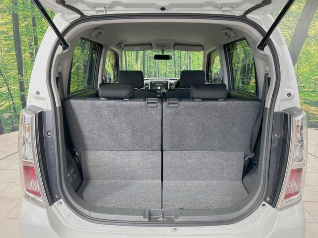 ワゴンRスティングレー X 禁煙車 スマートキー HIDヘッド フォグランプ オートエアコン 純正14インチアルミ CD 革巻きステアリング シートリフター バニティミラー 電動格納ミラー チルトステアリング イモビライザー(29枚目)