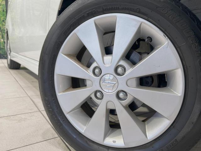 ワゴンRスティングレー X 禁煙車 スマートキー HIDヘッド フォグランプ オートエアコン 純正14インチアルミ CD 革巻きステアリング シートリフター バニティミラー 電動格納ミラー チルトステアリング イモビライザー(44枚目)