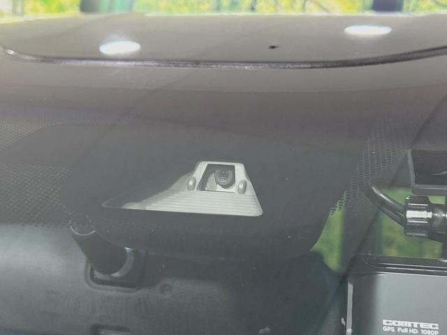 フリード Ｇ・ホンダセンシング　両側電動ドア　ＳＤナビ　後席モニター　Ｃパッケージ　バックカメラ　寒冷地仕様　ホンダセンシング　禁煙車　ドラレコ　スマートキー　ビルトインＥＴＣ　純正１５インチアルミ　オートエアコン　ＣＤ　ＤＶＤ再生（6枚目）