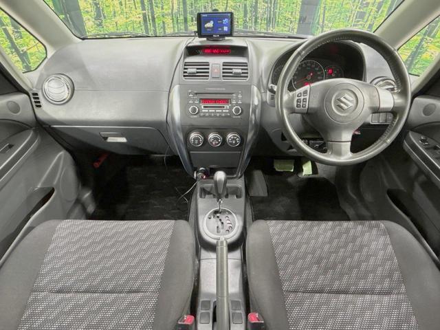 ＳＸ４ １．５ＸＧ　禁煙車　ポータブルナビ　ＥＴＣ２．０　オートエアコン　オートライト　電動格納ミラー　ＨＩＤヘッドライト　フロントフォグランプ　プライバシーガラス　純正革巻きステアリング（2枚目）