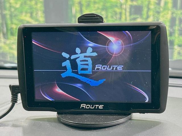 ＳＸ４ １．５ＸＧ　禁煙車　ポータブルナビ　ＥＴＣ２．０　オートエアコン　オートライト　電動格納ミラー　ＨＩＤヘッドライト　フロントフォグランプ　プライバシーガラス　純正革巻きステアリング（3枚目）