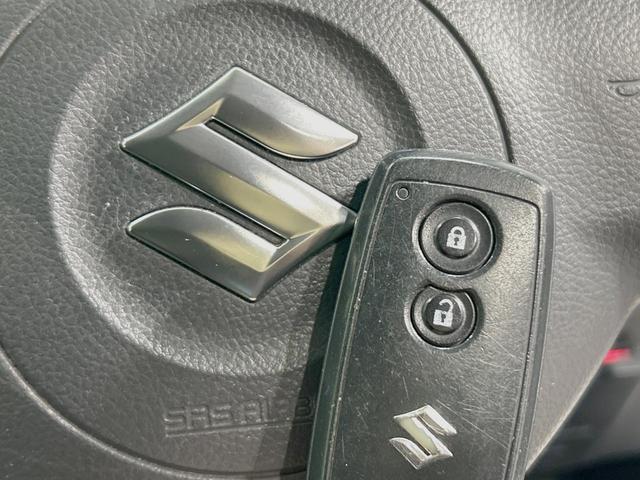 ＳＸ４ １．５ＸＧ　禁煙車　ポータブルナビ　ＥＴＣ２．０　オートエアコン　オートライト　電動格納ミラー　ＨＩＤヘッドライト　フロントフォグランプ　プライバシーガラス　純正革巻きステアリング（27枚目）