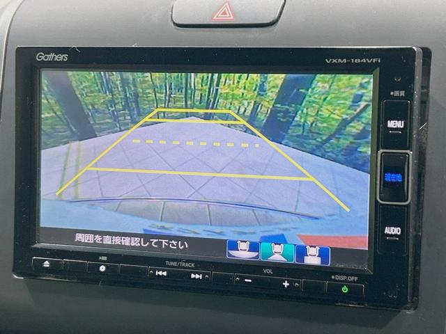 フリードハイブリッド ハイブリッド・Ｇホンダセンシング　禁煙車　純正ＳＤナビ　ホンダセンシング　レーダークルーズ　両側電動ドア　ＬＥＤヘッド　バックカメラ　ＥＴＣ　スマートキー　アイドリングストップ　７人乗り　オートエアコン　オートライト（4枚目）