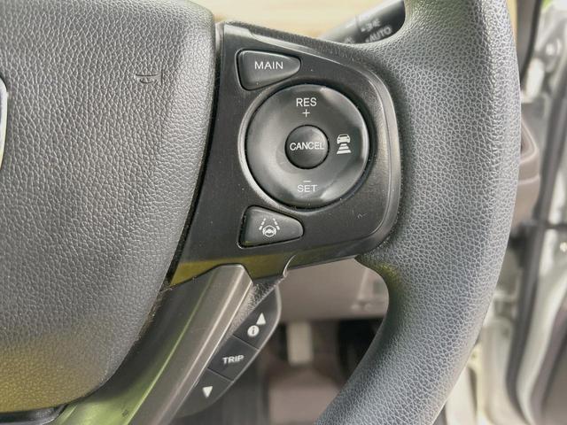 フリードハイブリッド ハイブリッド・Ｇホンダセンシング　禁煙車　純正ＳＤナビ　ホンダセンシング　レーダークルーズ　両側電動ドア　ＬＥＤヘッド　バックカメラ　ＥＴＣ　スマートキー　アイドリングストップ　７人乗り　オートエアコン　オートライト（6枚目）