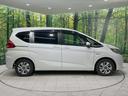 ハイブリッド・Ｇホンダセンシング　禁煙車　純正ＳＤナビ　ホンダセンシング　レーダークルーズ　両側電動ドア　ＬＥＤヘッド　バックカメラ　ＥＴＣ　スマートキー　アイドリングストップ　７人乗り　オートエアコン　オートライト（24枚目）
