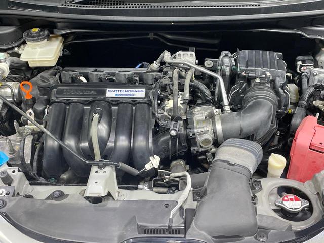 フィットハイブリッド Sパッケージ 禁煙車 純正SDナビ シティブレーキアクティブシステム クルーズコントロール LEDヘッド バックカメラ ETC 純正16インチアルミ スマートキー オートライト(18枚目)