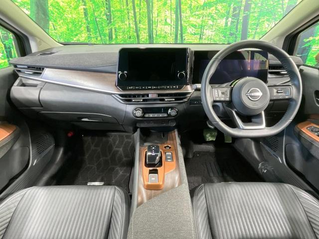 オーラ Ｇ　レザーエディション　禁煙車　純正９型ナビ　全周囲カメラ　ＢＯＳＥ　スマートルームミラー　ＢＳＭ　衝突軽減　プロパイロット　合皮レザー　ステアリングヒーター　クリアランスソナー　ＬＥＤヘッド　ＥＴＣ　純正１７インチアルミ（2枚目）