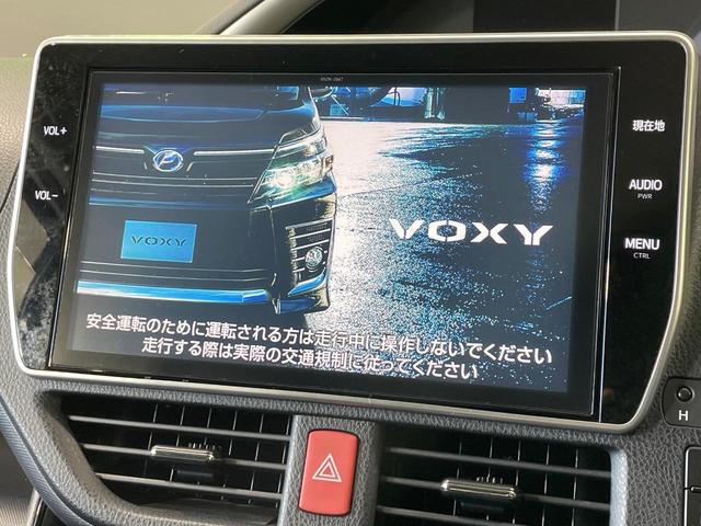 ヴォクシー ハイブリッドＺＳ　煌ＩＩ　禁煙車　純正１０型ナビ　フリップダウンモニター　セーフティセンス　両側電動ドア　ＬＥＤヘッド　バックカメラ　ＥＴＣ　純正１６インチアルミ　スマートキー　ワンオーナー（3枚目）