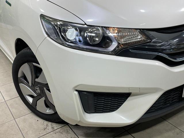 フィットハイブリッド Lパッケージ 禁煙車 純正SDナビ シティブレーキアクティブシステム クルーズコントロール ハーフレザー LEDヘッド バックカメラ ETC オートエアコン スマートキー オートライト(14枚目)