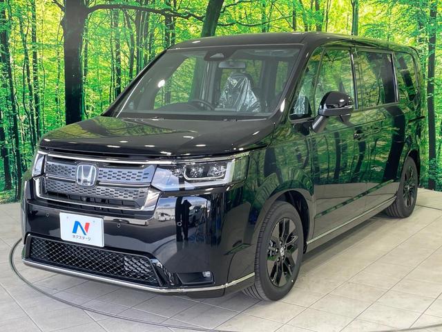 ステップワゴン e:HEVスパーダ 登録済未使用車 ホンダセンシング 全周囲カメラ レーダークルーズ ブラインドスポットモニター 両側電動ドア ハーフレザー シートヒーター 電動リア LEDヘッド 純正16インチアルミ スマートキー(21枚目)