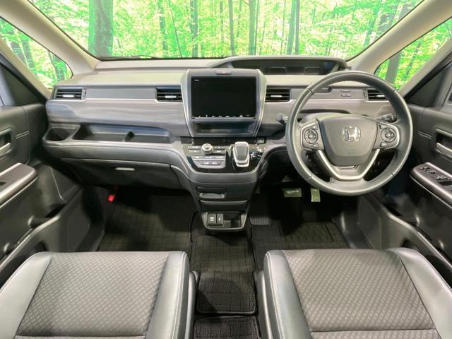 フリードハイブリッド ハイブリッド・Gホンダセンシング 禁煙車 両側電動ドア 純正9インチSDナビ バックカメラ 衝突被害軽減システム ハーフレザーシート 前席シートエアコン ドラレコ スマートキー LEDヘッド ETC クルコン 純正15インチアルミ(2枚目)