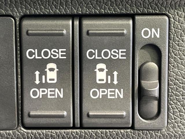 フリードハイブリッド ハイブリッド・Gホンダセンシング 禁煙車 両側電動ドア 純正9インチSDナビ バックカメラ 衝突被害軽減システム ハーフレザーシート 前席シートエアコン ドラレコ スマートキー LEDヘッド ETC クルコン 純正15インチアルミ(5枚目)