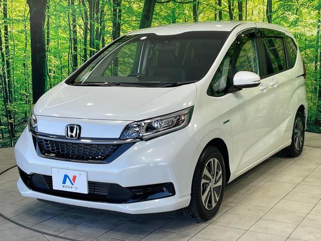 フリードハイブリッド ハイブリッド・Gホンダセンシング 禁煙車 両側電動ドア 純正9インチSDナビ バックカメラ 衝突被害軽減システム ハーフレザーシート 前席シートエアコン ドラレコ スマートキー LEDヘッド ETC クルコン 純正15インチアルミ(23枚目)