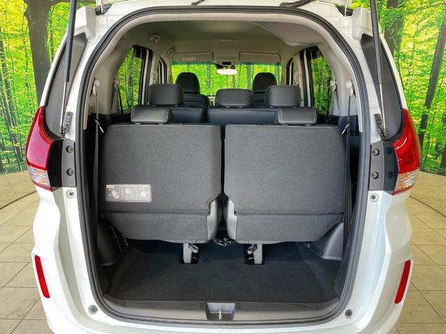 フリードハイブリッド ハイブリッド・Gホンダセンシング 禁煙車 両側電動ドア 純正9インチSDナビ バックカメラ 衝突被害軽減システム ハーフレザーシート 前席シートエアコン ドラレコ スマートキー LEDヘッド ETC クルコン 純正15インチアルミ(30枚目)