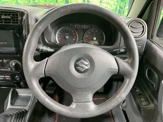ジムニー クロスアドベンチャー 4WD MT車 純正SDナビ 禁煙車 レザーシート ETC 純正16インチアルミ Bluetooth CD DVD再生 フルセグ(12枚目)