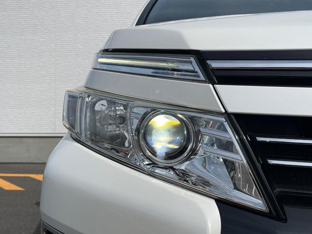 ヴォクシー ZS 煌 純正SDナビ 両側電動ドア バックカメラ 禁煙車 ドラレコ LEDヘッド ビルトインETC オートライト デュアルエアコン 純正16インチアルミ Bluetooth CD DVD再生(13枚目)