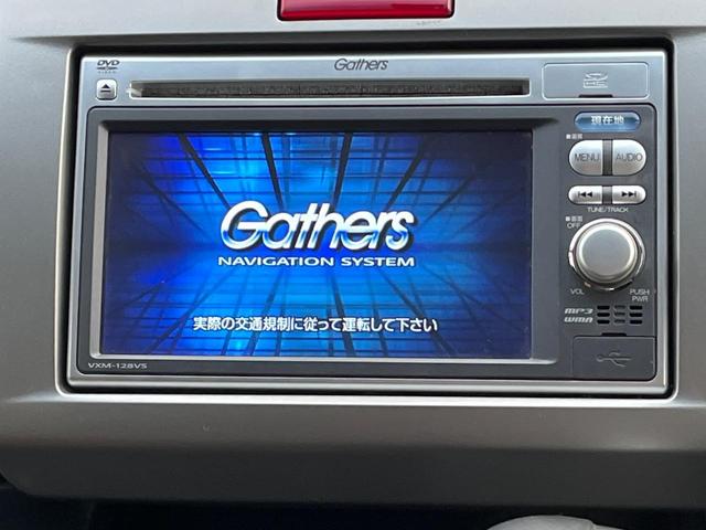 フリード GH メモリーナビ 電動スライドドア バックカメラ 禁煙車 HIDヘッド ETC オートライト オートエアコン 純正15インチアルミ CD DVD再生 地デジ(3枚目)