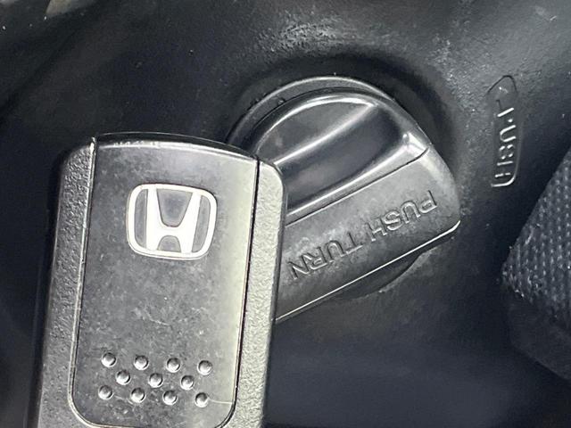 フリード GH メモリーナビ 電動スライドドア バックカメラ 禁煙車 HIDヘッド ETC オートライト オートエアコン 純正15インチアルミ CD DVD再生 地デジ(7枚目)