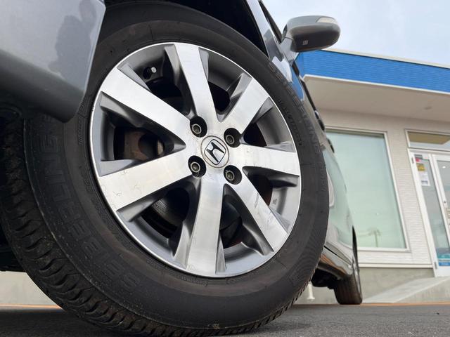 フリード GH メモリーナビ 電動スライドドア バックカメラ 禁煙車 HIDヘッド ETC オートライト オートエアコン 純正15インチアルミ CD DVD再生 地デジ(12枚目)