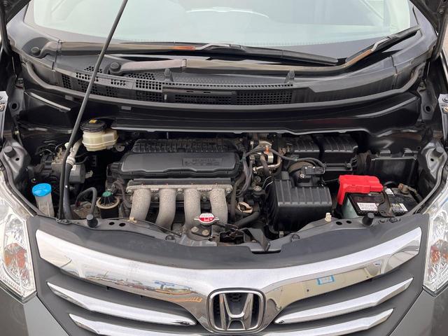 フリード GH メモリーナビ 電動スライドドア バックカメラ 禁煙車 HIDヘッド ETC オートライト オートエアコン 純正15インチアルミ CD DVD再生 地デジ(18枚目)