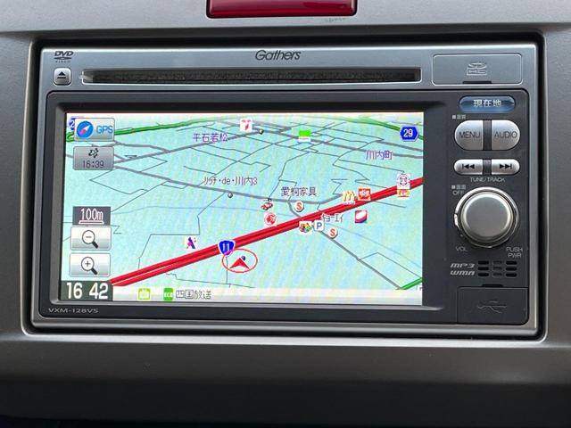 フリード GH メモリーナビ 電動スライドドア バックカメラ 禁煙車 HIDヘッド ETC オートライト オートエアコン 純正15インチアルミ CD DVD再生 地デジ(22枚目)