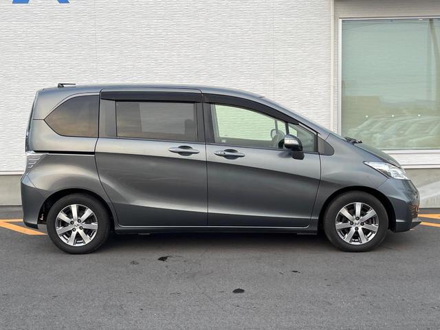 フリード GH メモリーナビ 電動スライドドア バックカメラ 禁煙車 HIDヘッド ETC オートライト オートエアコン 純正15インチアルミ CD DVD再生 地デジ(38枚目)