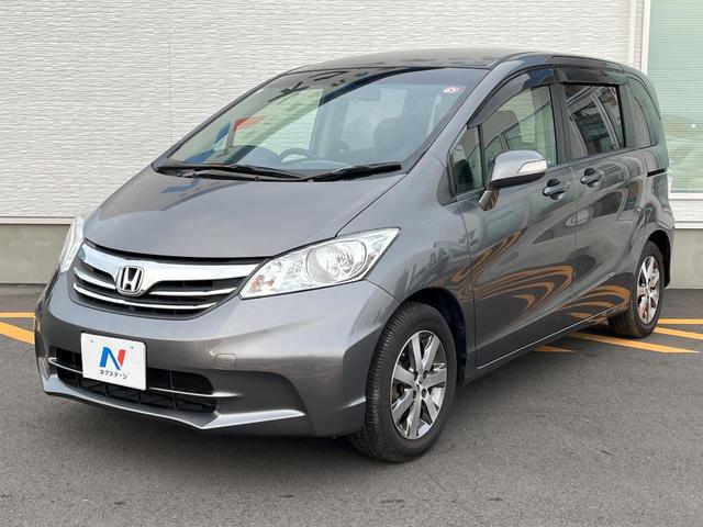 フリード GH メモリーナビ 電動スライドドア バックカメラ 禁煙車 HIDヘッド ETC オートライト オートエアコン 純正15インチアルミ CD DVD再生 地デジ(39枚目)