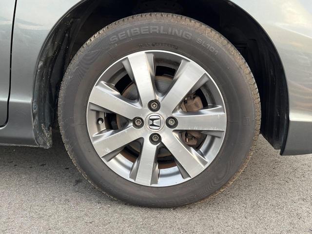 フリード GH メモリーナビ 電動スライドドア バックカメラ 禁煙車 HIDヘッド ETC オートライト オートエアコン 純正15インチアルミ CD DVD再生 地デジ(42枚目)