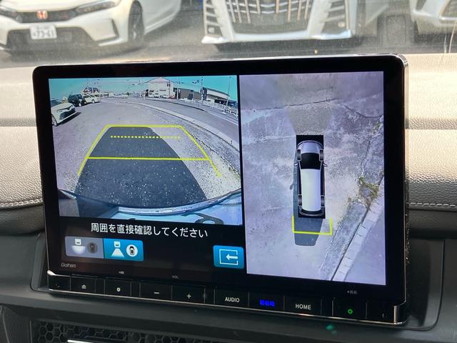 ステップワゴン ｅ：ＨＥＶスパーダ　７人乗り　マルチビューカメラシステム　ギャザーズナビ　ブラインドスポットインフォメーション　ホンダセンシング　メモリー機能付パワーテールゲート　シートヒーター　ドラレコ　ＥＴＣ　両側パワースライドドア（4枚目）