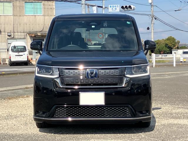ステップワゴン ｅ：ＨＥＶスパーダ　７人乗り　マルチビューカメラシステム　ギャザーズナビ　ブラインドスポットインフォメーション　ホンダセンシング　メモリー機能付パワーテールゲート　シートヒーター　ドラレコ　ＥＴＣ　両側パワースライドドア（6枚目）