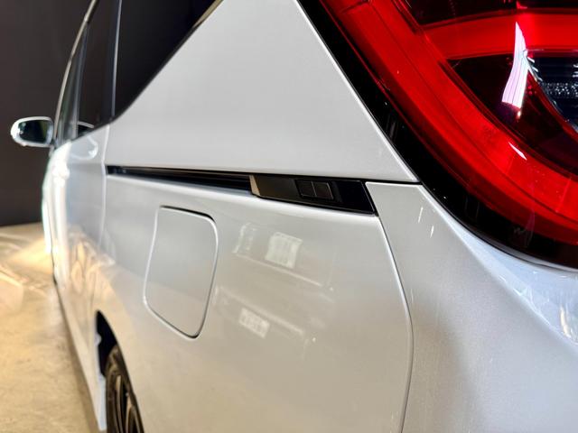 ノア ハイブリッドS-Z マイナーチェンジ後 全周囲モニター 両側電動スライドドア ユニバーサルステップ ディスプレイオーディオ フリップダウンモニターデジタルインナーミラー オットマン ETC2.0 ステアリングヒーター(11枚目)