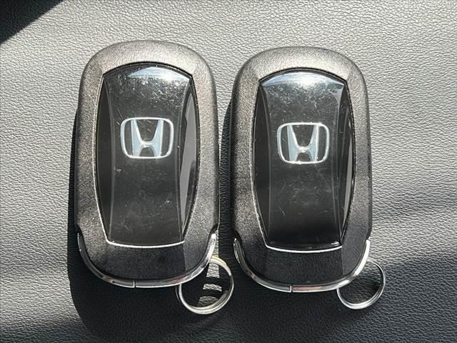 ヴェゼル ｅ：ＨＥＶ　Ｘ　禁煙　純正９型ナビ　Ｂモニタ　ワイヤレス充電　ＥＴＣ２．０　フルセグ　ＢＴ　ホンダセンシング　ＬＥＤヘッド　Ａライト　１６インチＡＷ　スマートキ　Ｐスタート　電子Ｐ　Ａホールド　パドルシフト（35枚目）
