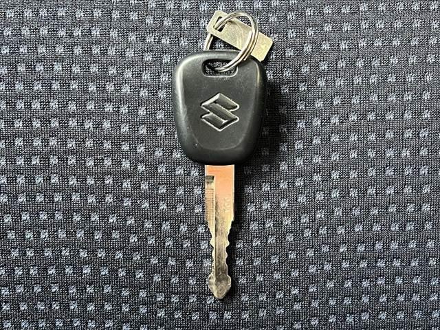 ワゴンＲ ＦＸ　５速ＭＴ　禁煙　車検整備付　ＣＤオーディオ　ＡＢＳ　リモコンキー　イモビライザー　セキュリティーアラーム　ピラーアンテナ　ヘッドライトレベライザー　１２Ｖ／１２０Ｗシガーソケット　プライバシーガラス（30枚目）