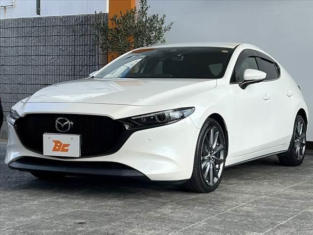 MAZDA3ファストバック 20S Lパッケージ 禁煙 360度ビュー 地デジ DVD 8.8型ナビ CD ETC スマートブレーキ クルコン LEDヘッド BSM Pシート シートヒータ ステアリングヒータ 黒革シート スマートキー Pスタート(10枚目)