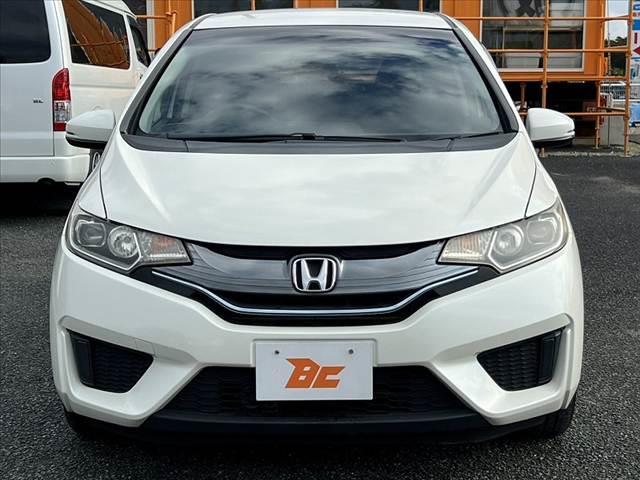 フィットハイブリッド Ｌパッケージ　純正ナビ　地デジ　ＤＶＤ　ＢＴ　ＬＥＤヘッドライト　バックモニター　クルーズコントロール　ステリモ　スマートキー　プッシュスタート　ハーフレザーシート　オートライト　シートリフター　チルトステアリング（9枚目）