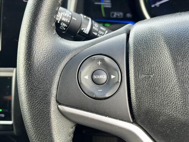 フィットハイブリッド Ｌパッケージ　純正ナビ　地デジ　ＤＶＤ　ＢＴ　ＬＥＤヘッドライト　バックモニター　クルーズコントロール　ステリモ　スマートキー　プッシュスタート　ハーフレザーシート　オートライト　シートリフター　チルトステアリング（23枚目）