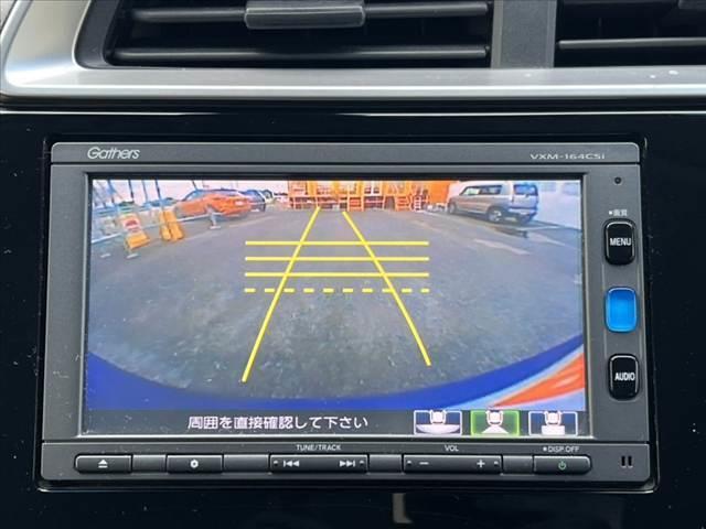 フィットハイブリッド Ｌパッケージ　禁煙　中期　純正ナビ／Ｂｌｕｅｔｏｏｔｈ　クルコン　ＣＴＢＡ　ＬＥＤヘッド　Ｐガラス　革巻きステア　電動格納ミラー　プラズマクラスター　プライムスムースコンビシート　スマートキー　Ｐスタート（3枚目）