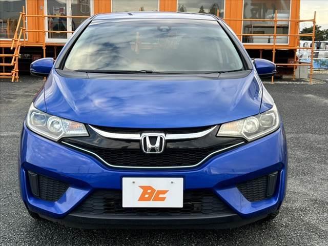 フィットハイブリッド Ｌパッケージ　禁煙　中期　純正ナビ／Ｂｌｕｅｔｏｏｔｈ　クルコン　ＣＴＢＡ　ＬＥＤヘッド　Ｐガラス　革巻きステア　電動格納ミラー　プラズマクラスター　プライムスムースコンビシート　スマートキー　Ｐスタート（9枚目）