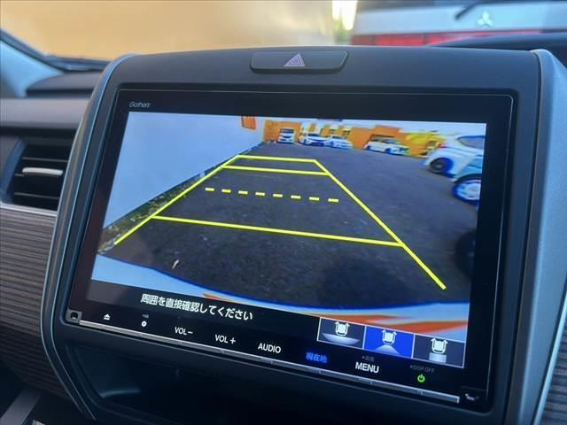 フリードハイブリッド ハイブリッド・クロスターホンダセンシング　禁煙車　車検整備付　後期　９型ナビ　ホンダセンシング　フルセグ　バックカメラ　両電スラ　ＬＥＤヘッド　オートライト　スマートキー　純１５インチＡＷ　合皮コンビシート　ルーフレール　ＥＴＣ　ドラレコ（7枚目）