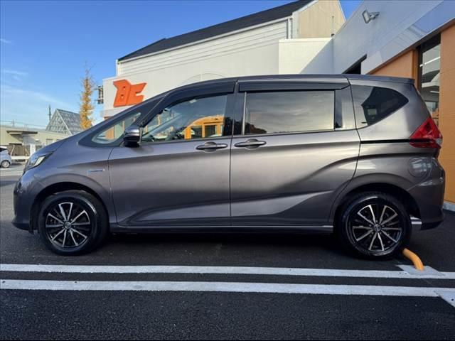 フリードハイブリッド ハイブリッド・Ｇホンダセンシング　禁煙車　ホンダセンシング　両電スラ　インターナビセット　Ｂカメラ　フルセグ　ＬＥＤヘッド　　シートヒーター　２列目キャプテンシート　ロールサンシェード　スマートキー　ＥＴＣ　ドラレコ　外１５ＡＷ（11枚目）