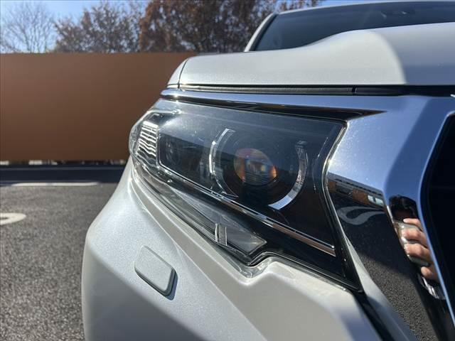 ランドクルーザープラド ＴＸ　禁煙車後期　サンルーフ　純正ナビ　フルセグＴＶ　ルーフレール　バックカメラ　ブルートゥース　ＬＤＡ　レーダークルーズ　ＬＥＤヘッドライト＆フォグ　リアスモークフィルム　シートカバー　スマートキー２個（33枚目）