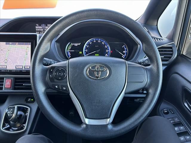 ヴォクシー ハイブリッドＸ　禁煙車　車検整備付　９インチナビ　フルセグ　バックカメラ　電スラ　スマートキー　ＬＥＤヘッド　Ａライト　プッシュスタート　サイドテーブル　イージークローザー　シートバックポケット　ステリモ　ＥＴＣ（25枚目）