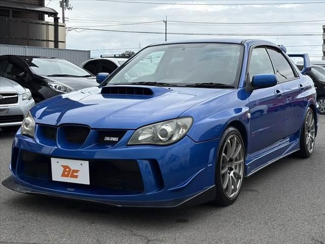 インプレッサ WRX STi 後期 車検整備付 RECAROシート ZEROSPOORTエアロ 社外18インチAW 社外マフラー 社外HDDナビ HID フォグ ターボ 4WD ローダウン 大型Rスポイラー 電格ミラー 革巻ステア(10枚目)