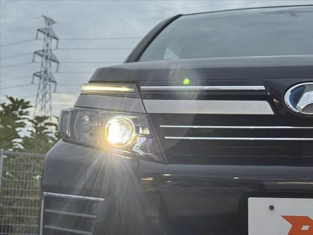 ヴォクシー ハイブリッドZS 煌II 車検整備付 禁煙車 フルセグナビ セーフティセンスC 電動スライドドア Pスタート Bモニター ETC LED Aハイビーム 先行車発進告知機能 クルコン Aライト 革巻きステアリング BT ステリモ(35枚目)